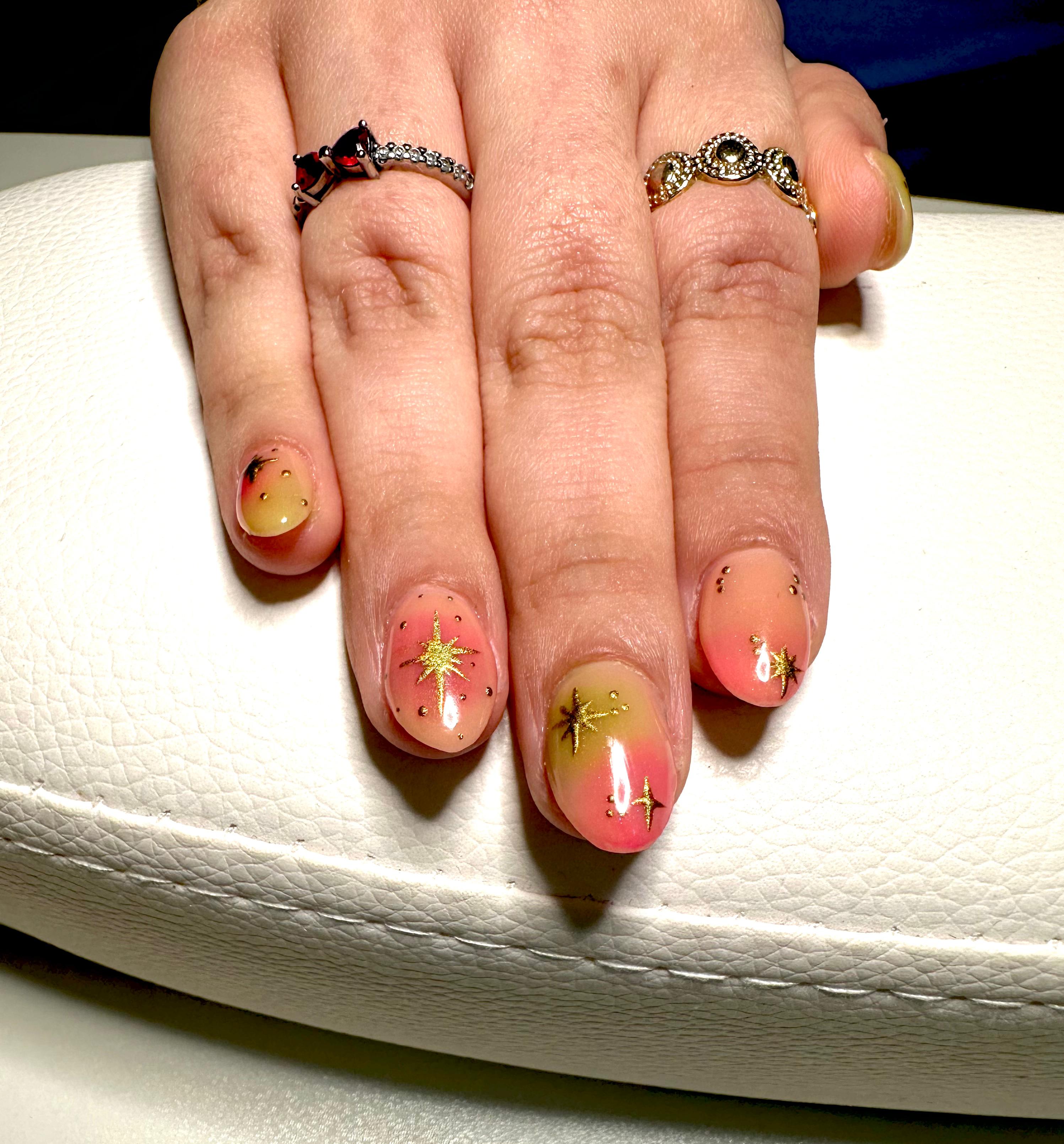 Pink and gold nail art.